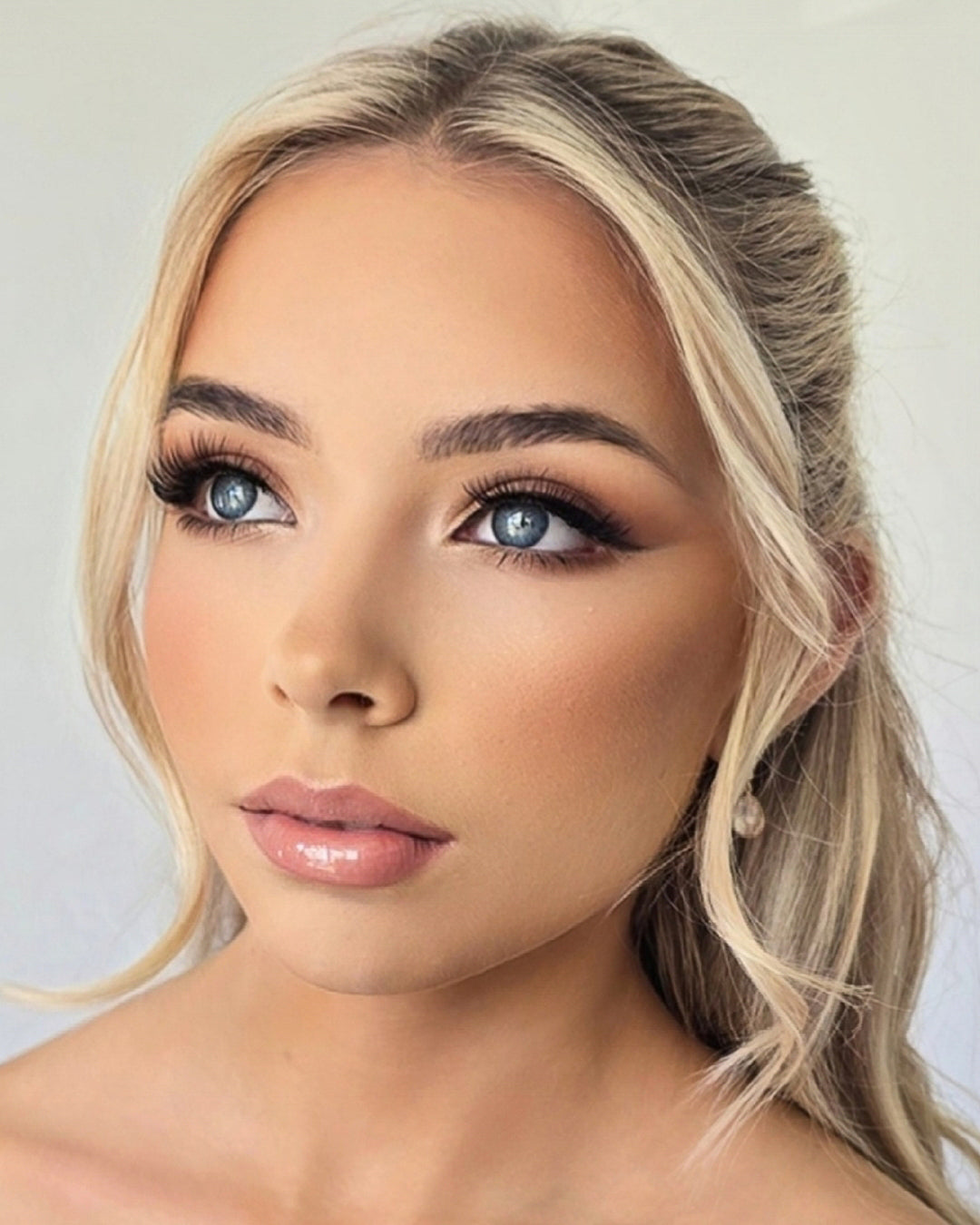 Professional soft glam makeup with radiant skin and seamless blend, natural glowing complexion Gold Coast makeup artist