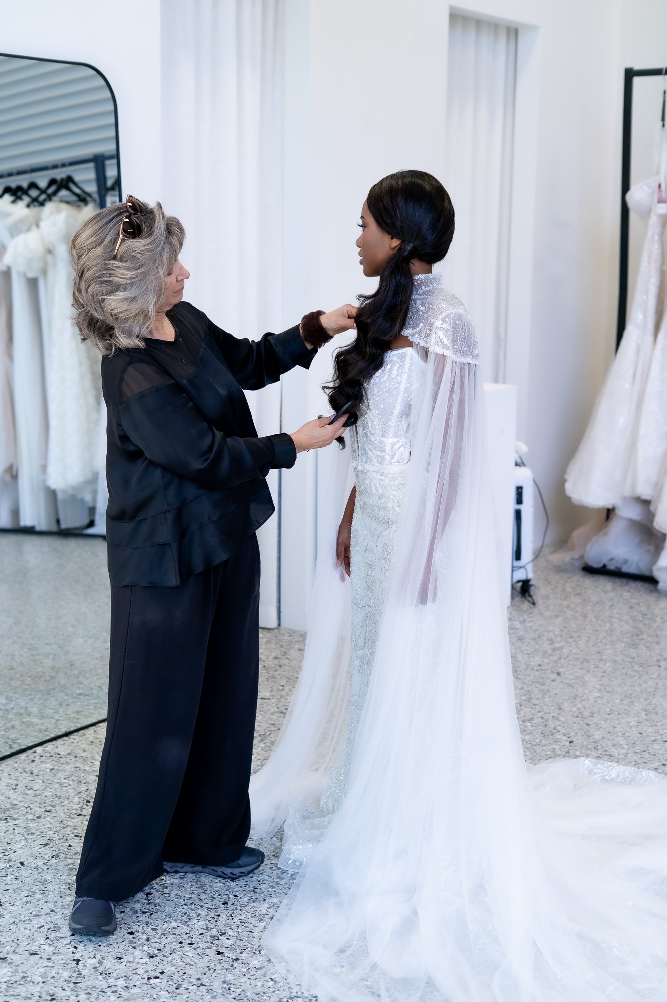 Katherine Art and hairstylist Natalie creating an elegant bridal look on the Gold Coast.